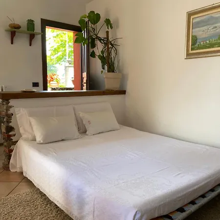 La Casa Rosa Di Riso Amaro Apartment